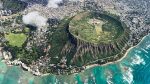 Flying over Diamond Head on airfare to Hawaii from Panda Travel.